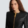 Kısa peplum kuzu derisi ceket