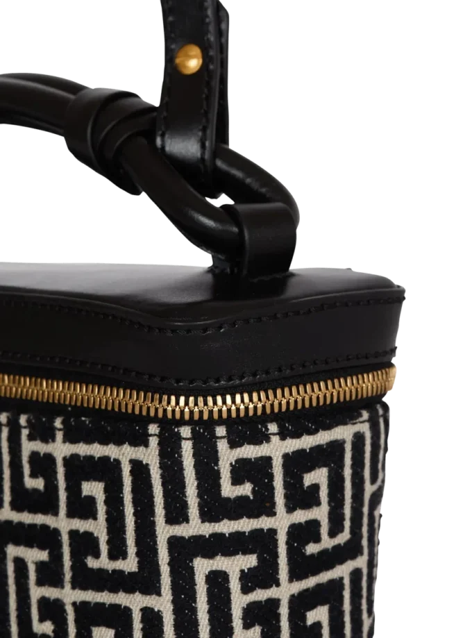 Monogramlı kanvas ve deriden B-Army makyaj çantası Monogramlı kanvas ve deriden B-Army makyaj çantası